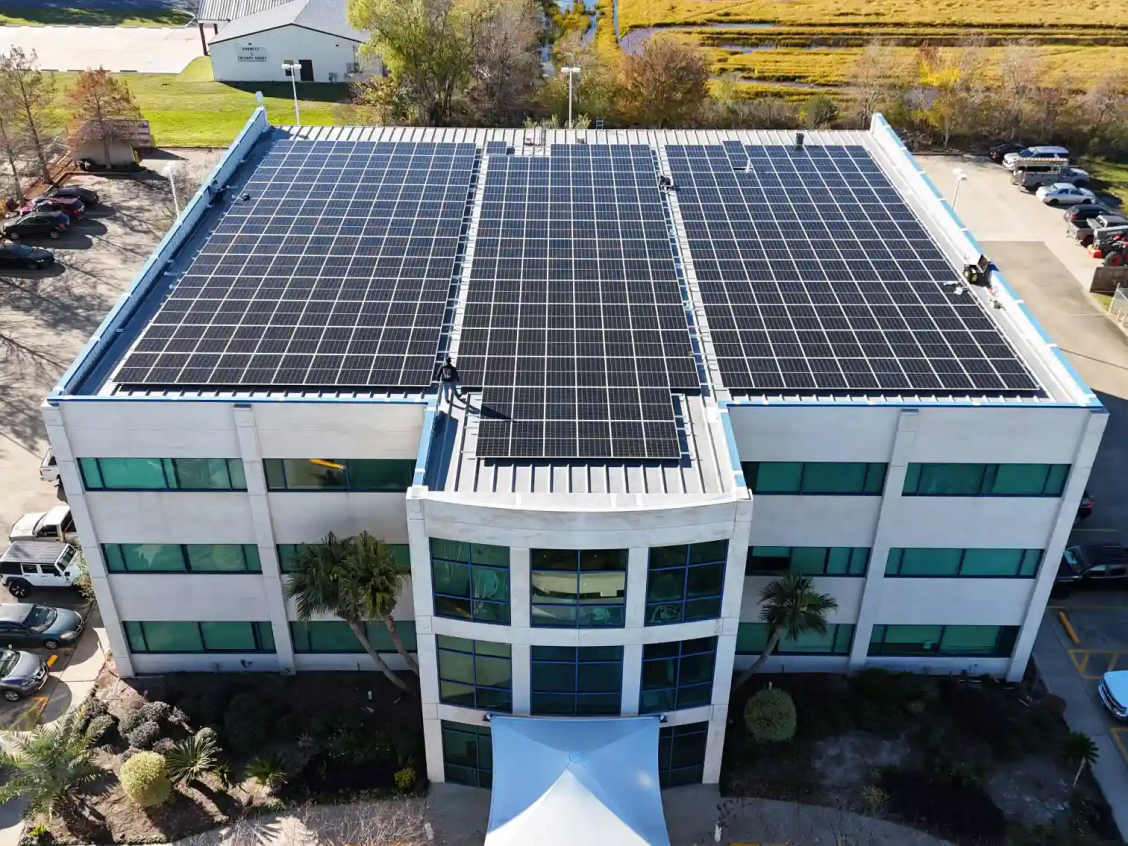 Corporate office park building with rooftop solar installation - replace with your project photo