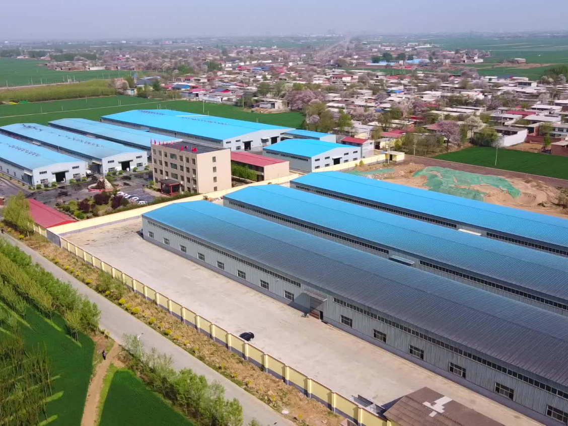 Engineering and auto component manufacturing floor with rooftop solar - replace with your project photo